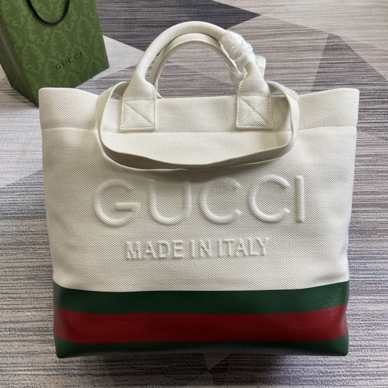 G*u*i shopping bags